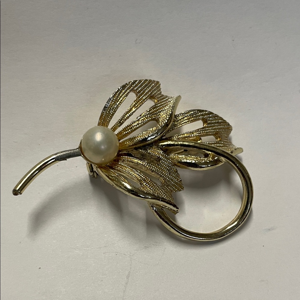 Mid century gold-tone leaf with faux pearl cabochon